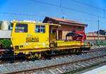 Bei Fiumefreddo di Sicilia (Sizilien) konnte ich am 20.07.2022 aus dem Zug heraus diesen Plasser & Theurer OBW-10 FS, den IT-RFI 150 124-1, ein Schwerer Oberbauwagen mit Ladeflche und Spezialkran der